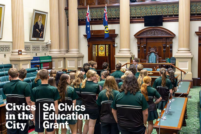 Students participating in a guided tour inside the House of Assembly chamber at Parliament House, as part of the Civics in the City program.